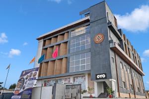 a building with a sign on the side of it at Palette - Hotel Saket Greens in Bhopal +59 photos