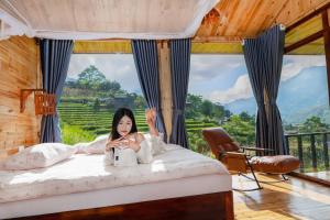 Postel nebo postele na pokoji v ubytování Hmong House - Sapa Retreat
