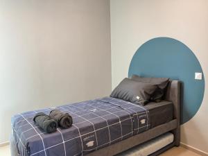 Ένα ή περισσότερα κρεβάτια σε δωμάτιο στο D Aman Infinity Pool and AS Tower View Homestay 06 +98 φωτογραφίες