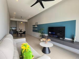 Χώρος καθιστικού στο D Aman Infinity Pool and AS Tower View Homestay 06