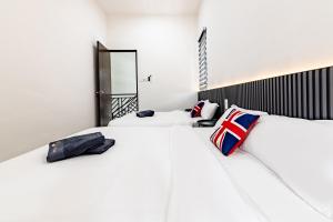 Ένα ή περισσότερα κρεβάτια σε δωμάτιο στο i Homes Villa 3 Nearby Sunway - Swimming Pool and Karaoke +32 φωτογραφίες