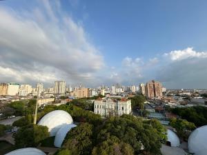 a view of a city with buildings and trees at Cantinho da Bandeira in Belém