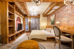 Postel nebo postele na pokoji v ubytování 重庆暖余江景民宿 Chongqing Nuanyu River View Hotel