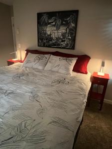 a bedroom with a bed with a drawing on it at Sir Happy's Place in Elkins