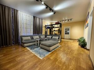 a living room with a couch and a table at Guesthouse Gorilla 