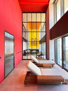 Ένα ή περισσότερα κρεβάτια σε δωμάτιο στο Ananti at Busan Village