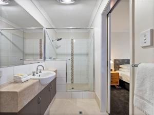 a bathroom with a sink and a shower at 63@CapeView, Geographe bay in Busselton +17 photos
