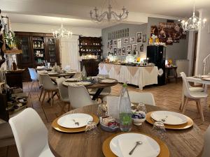 Φωτογραφία από το άλμπουμ του Incanto Chic B&B nelle Scuderie σε Sacrofano +92 φωτογραφίες