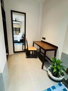 Ένα ή περισσότερα κρεβάτια σε δωμάτιο στο Delhi House