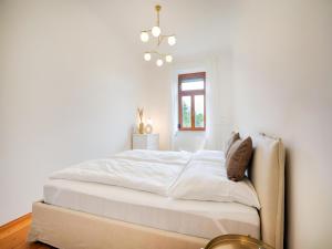 Ένα ή περισσότερα κρεβάτια σε δωμάτιο στο Apartment in Graz near unseco City Center