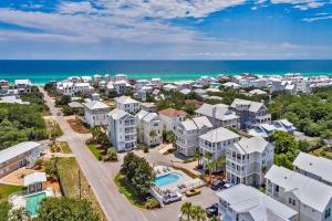 an aerial view of a city with the ocean at Mermaid Cove in Inlet Beach