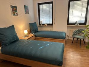 Ένα ή περισσότερα κρεβάτια σε δωμάτιο στο Ferienwohnung GoJa 2 +5 φωτογραφίες