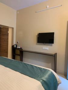 Postel nebo postele na pokoji v ubytování Banyan Tree Resort