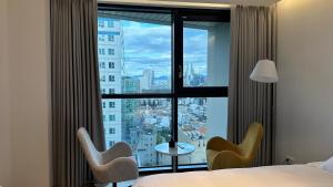 Postel nebo postele na pokoji v ubytování Caelum Black Gangnam Luxury Apt 카일룸블랙 강남 럭셔리 아파트