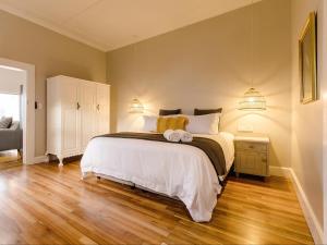 Postel nebo postele na pokoji v ubytování Water View Villas - Millwood Premium Apartment