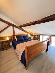 Postel nebo postele na pokoji v ubytování La Maison de Pierre Charmante