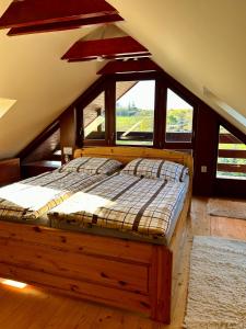 Postel nebo postele na pokoji v ubytování Penzión Bakova Jama