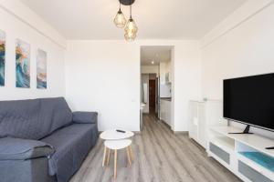 Μια τηλεόραση ή/και κέντρο ψυχαγωγίας στο Apartment Beautiful Sea View Las Vistas