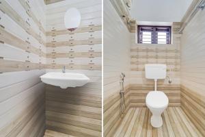 a bathroom with a toilet and a sink at Super Hotel O Kazhakkoottam Near Technopark Phase 3 in Trivandrum