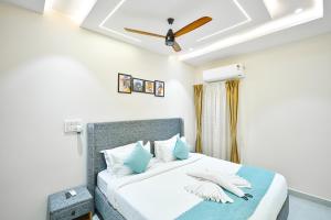 Ένα ή περισσότερα κρεβάτια σε δωμάτιο στο 3bhk serviced apartment near omega hospital