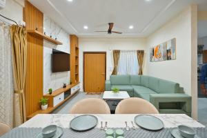 Μια τηλεόραση ή/και κέντρο ψυχαγωγίας στο 3bhk serviced apartment near omega hospital +4 φωτογραφίες