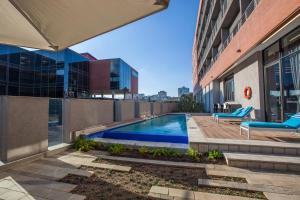 a swimming pool on the roof of a building at City Lodge Newtown, Johannesburg in Johannesburg +19 photos