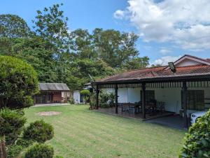 Κήπος έξω από το D'Garden Cottage Kluang