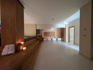 TV a/nebo společenská místnost v ubytování Alternative Relax Rooms by Oikia Vacanze