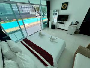 A television and/or entertainment centre at Baancivilize Resort