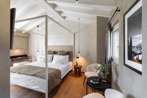 Postel nebo postele na pokoji v ubytování Il Mansio Vegan Hotel and Restaurant