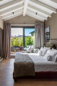 Postel nebo postele na pokoji v ubytování Il Mansio Vegan Hotel and Restaurant