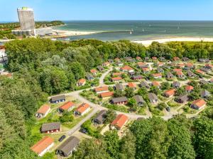 an aerial view of a housing estate next to the beach at Schatzkiste - Dorf Ferienhaus 08 in Priwall