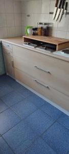 a kitchen with a counter with a counter top at CheapStayVilnius in Vilnius