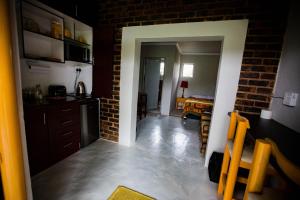 Kuchyň nebo kuchyňský kout v ubytování Inyameko BnB + 8 fotografií