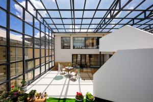 a view of therium of a building with a glass ceiling at Shangri La cuckoo hotel in Shangri-La