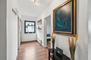 TV a/nebo společenská místnost v ubytování Monteur Wohnung Bedburg-Hau BH01