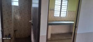 een deur naar een kamer met een raam en een vensterbank bij Maa Durga Apartment in Dhanbad