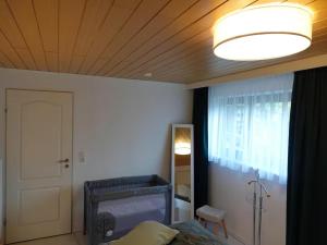 Postel nebo postele na pokoji v ubytování Ferienwohnung im Kannenbäckerland