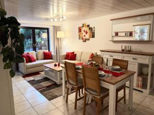 Posezení v ubytování Ferienwohnung im Kannenbäckerland + 40 fotografií