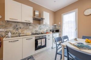 Kuchyň nebo kuchyňský kout v ubytování La Terrazza Di Porticello