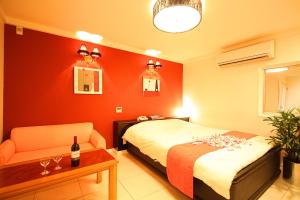 A bed or beds in a room at ホテル 夢街道