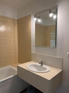 Vannituba majutusasutuses Charmant Appartement proche plage