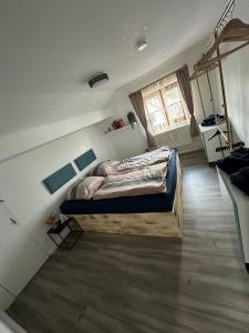 Postel nebo postele na pokoji v ubytování Heimat Apartment