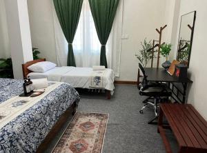 Ένα ή περισσότερα κρεβάτια σε δωμάτιο στο La wood homestay