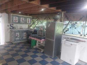 Kuchyň nebo kuchyňský kout v ubytování Villa Vula Vala