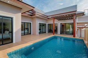 an image of a swimming pool in a house at ทองสุข Pool Villa 3 ห้องนอน in Ban Huai Thalaeng Phan