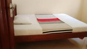 Ένα ή περισσότερα κρεβάτια σε δωμάτιο στο Legacy villas