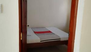 Ένα ή περισσότερα κρεβάτια σε δωμάτιο στο Legacy villas