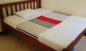 Ένα ή περισσότερα κρεβάτια σε δωμάτιο στο Legacy villas