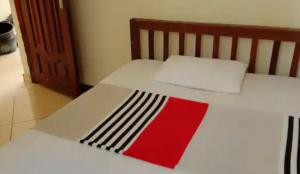 Ένα ή περισσότερα κρεβάτια σε δωμάτιο στο Legacy villas